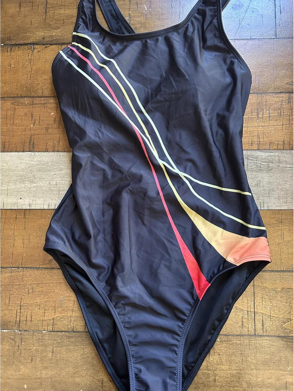 Black One-Piece Athletic Swimsuit with Colorful Stripe Detail